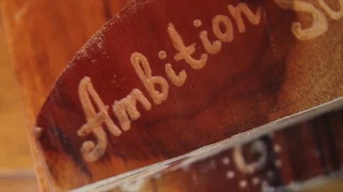 Write on the tree word Ambition Stock Footage 71986949