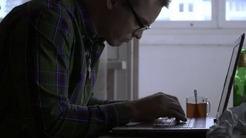 A writer or a programmer works at home for a laptop not for the first day. A man Stock Footage 81903296