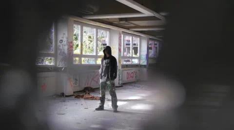 Writer standing in abandoned building Video stock 58631461