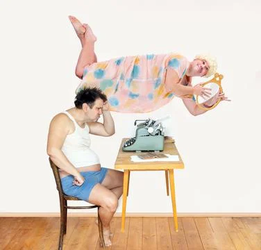 The writer thinks about the text his story, on the background levitates muse Stock Photos