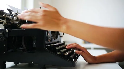 Writer typing on retro typewriter Stock Footage 94584111