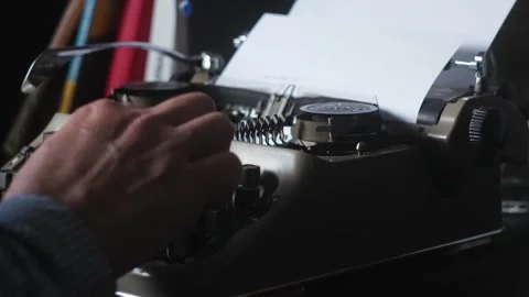 The writer is typing on a typewriter. Stock Footage 248708138