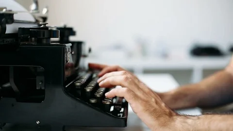 Writer typing with vintage typewriter Video stock 94584179