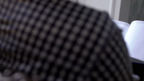 Writer working on his book Stock Footage 104003067