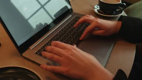The writer writes a book on a laptop Stock Footage 171621853