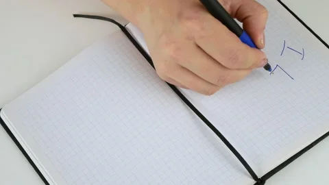 Writes by hand in a notebook.I like the inscription in English. Stock Footage 140803853