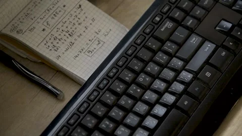 Writes on a keyboard Stock Footage 153029466