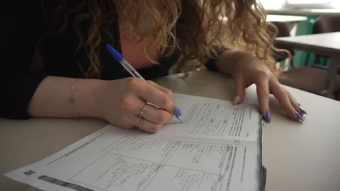 Writes at school Video stock 97535074