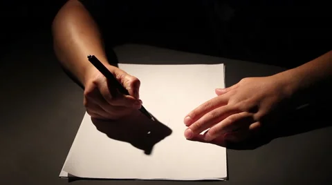 Writes on a white paper Stock Footage 54639803