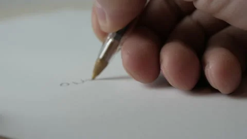 Writes on a white sheet with the pen Stock Footage 167289668