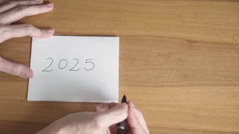 Writing “2025” on Paper: A Glimpse of the Future Stock Footage 282683088