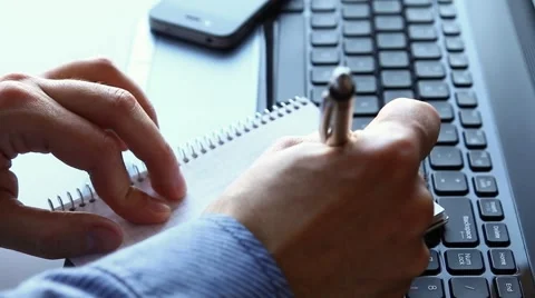 Writing and drawing in notepad Stock Footage 46974597