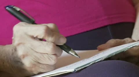 Writing with Arthritis - Front View Stock Footage 22797349