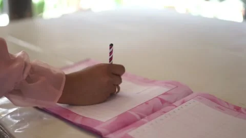 Writing an Attendance List in a Guest Book at an Event 動画素材 344541052
