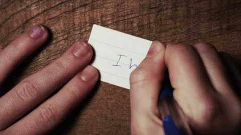 Writing with ballpoint pen "I hate you" Stock Footage 301998196