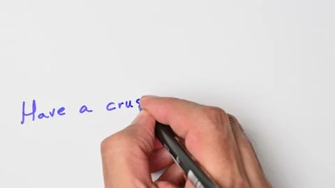 Writing with a blue marker the sentence: Have a crush on someone Stock Footage 221782253