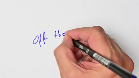 Writing with a blue marker the sentence: Off the hook Stock Footage 221782634