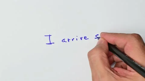 Writing with a blue marker the sentence: I arrive soon Stock Footage 221781285