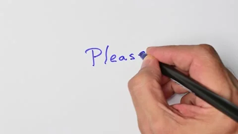 Writing with a blue marker the sentence: Please Stock Footage 221780789