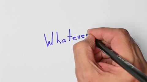 Writing with a blue marker the sentence: Whatever Stock Footage 221781845