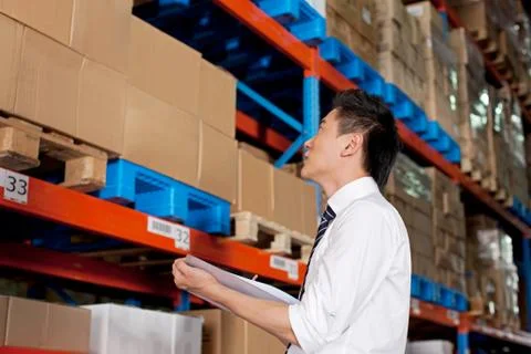 Writing board Stacking Young men Oriental figures Asian Work Check Logistics Stock Photos