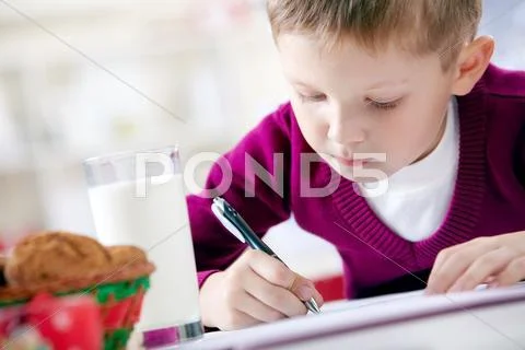 Writing boy Stock Photos