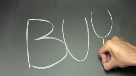 Writing on chalkboard BUY - HD Stock Footage 5299457