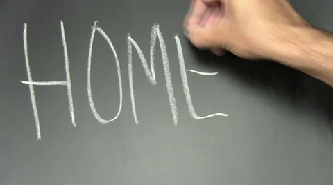Writing on chalkboard HOME - HD Stock Footage 5299577