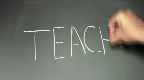 Writing on chalkboard TEACH - HD Stock Footage 5317441