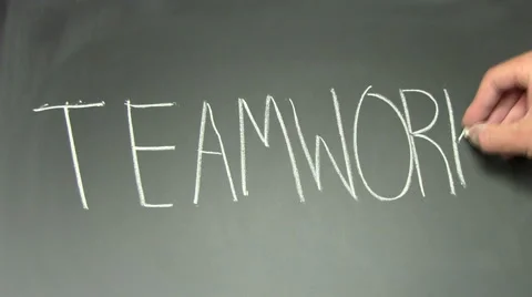 Writing on chalkboard TEAMWORK - HD Stock Footage 5318978