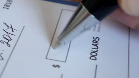 Writing a check for a cash amount Video stock 72154172