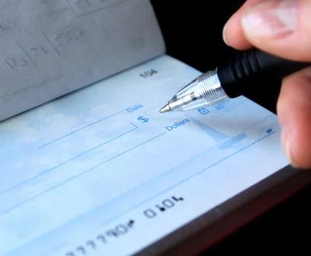 Writing a check Foto stock