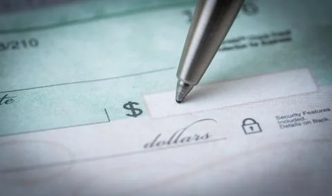 Writing a check Stock Photos
