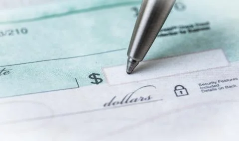 Writing a check Stock Photos