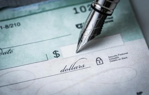 Writing a check Stock Photos