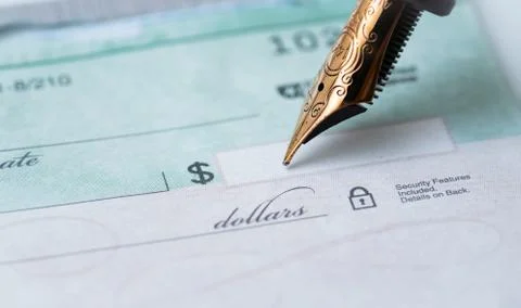 Writing a check Stock Photos