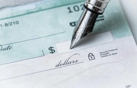 Writing a check Stock Photos
