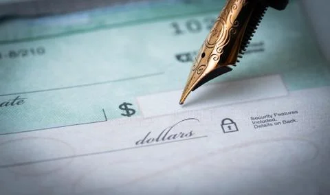 Writing a check Foto stock