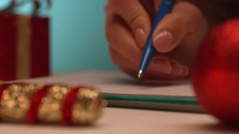 Writing Christmas Cards with Decorations. Stock Footage 258571522