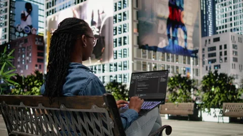 Writing code on laptop, implementing programming language, software developer Stockbeeldmateriaal 334169605