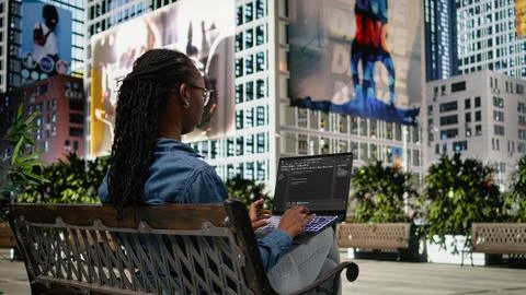 Writing code on laptop, implementing programming language, software developer 스톡 사진