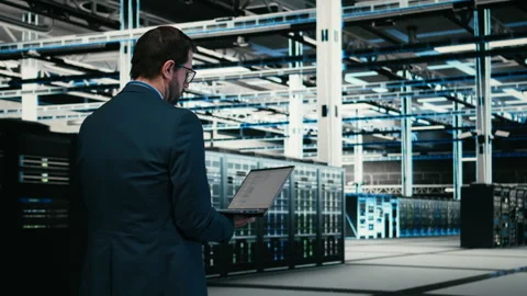 Writing code, laptop program and software developer in data center 스톡 동영상 329945351