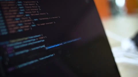 Writing code on laptop. Software Developer writes code from home. Stock Footage 130375177