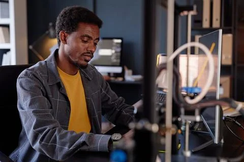 Writing Code in Modern Office Setting Stock Photos