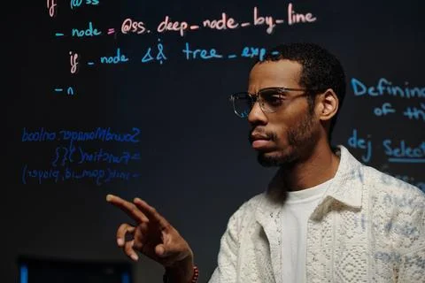 Writing Code on Transparent Screen for Developing Application 库存照片