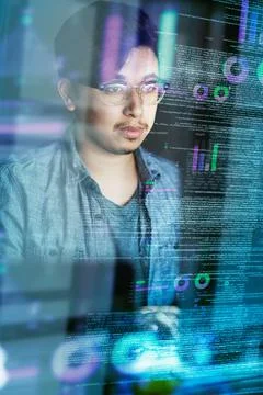 Writing code is what he does. Cropped shot of a young computer programmer loo Fotos Stock