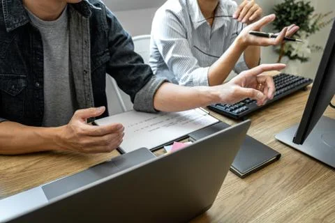 Writing codes and typing data code technology, Programmer team working on web Stockfoto's