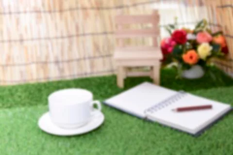 Writing on copy space note book on green grass Background.With selective focu Stock-Fotos