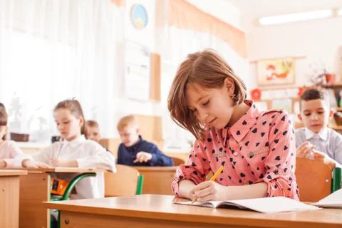 Writing at the copybook Stock Photos