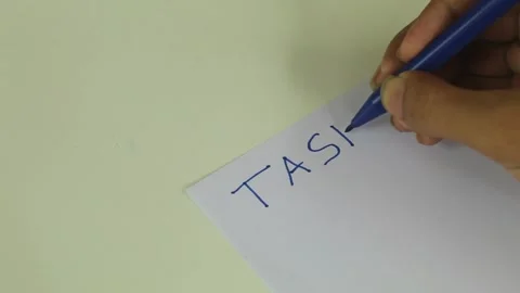 Writing Daily Task List on Paper Stockbeeldmateriaal 345712424